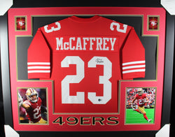 Christian McCaffrey framed autographed red jersey