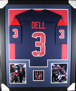 Tank Dell framed autographed blue jersey