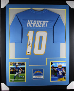 Justin Herbert framed autographed powder blue jersey