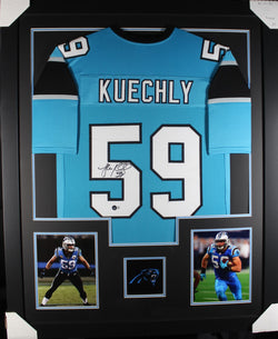 Luke Kuechly framed autographed teal jersey