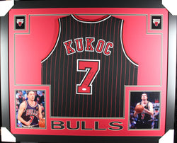 Tony Kukoc framed autographed black pin-stripe jersey